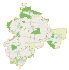 Mapa konturowa gminy Mykanów, blisko centrum na dole znajduje się punkt z opisem „Topolów”