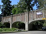 Reinforces concrete piers and arches supporting a walkway