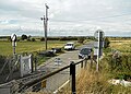 Normans Bay level crossing from a train