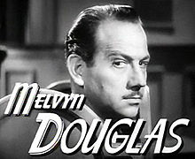 O actor estausunidense Melvyn Douglas en a cinta We Were Dancing (1942).