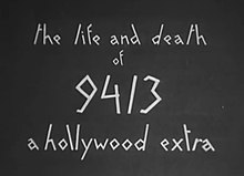 A gray screen with the words "the life and death of 9413 a hollywood extra" written in white text, in an an angled, jagged font.