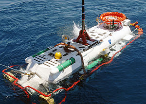 LR5 rescue vehicle is lowered into the water by a crane from the Finnish icebreaker MSV Fennica