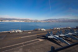 View of coast and port from a ship at anchor