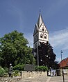 Saint Remigius's Church (Cath.) with Sebastian Münster statue