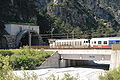 Tunnel an der Pontebbana-Neubaustrecke - Ich sehe ein Tunnelportal, aber den meisten Teil des Bildes nimmt eine Brücke ein