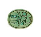 A small steatite scarab with hieroglyphs incised into it