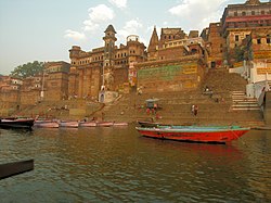 Left to Right, Top to Bottom: Ahilya Ghat, Chet Singh Ghat, Kedar Ghat, Ganga Aarti at Dashashwamedh Ghat, Ganges River bank along Varanasi, Man offering prayers to the river Ganga, Dashashwamedh Ghat