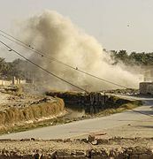 Iraqi building hit with Hellfire missile.jpg