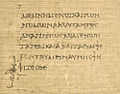 The final lines of Hypereides' In Philippidem with the coronis (in concert with a forked paragraphos marking the end of the speech (P.Lit.Lond. 134 col. ix, 2nd century BCE).