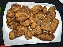 A tray of Italian-American style chicken cutlets