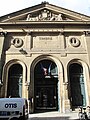 Hôtel du Timbre, rue de la Banque, Paris, tympans à claire-voie.