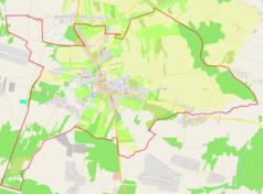 Mapa konturowa Żarnowa, blisko centrum na lewo u góry znajduje się punkt z opisem „Kościół św. Mikołaja”