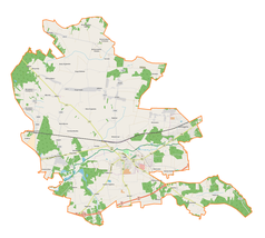 Mapa konturowa gminy Łask, blisko centrum na lewo znajduje się punkt z opisem „Łask”