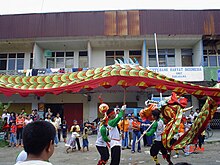 Liong Chinese dragon dance on the street of Sukadana