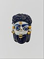 Image 13Face bead; mid-4th–3rd century BC; glass; height: 2.7  cm; Metropolitan Museum of Art (from Phoenicia)