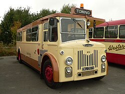 A towing vehicle converted from a cut-down Leyland half cab double decker bus by South Yorkshire PTE.