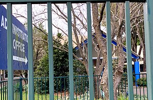 The administration office behind the school gates