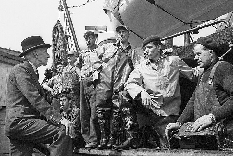 File:Rt. Hon. Vincent Massey discussing with fishermen.jpg