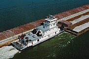 Towboat Dakota Storm upbound on Ohio River at Matthew E. Welsh Bridge (3 of 4), near Mauckport, Indiana, USA, 1987