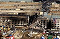 The Pentagon damaged by fire and partly collapsed.