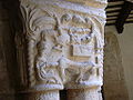 Romanesque capital in the cloister of the collegiate church in Alquézar. Represents an angel saving Isaac from being ritually murdered by his father Abraham →