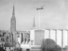 A Belvedere helicopter lifts the spire over Coventry Cathedral