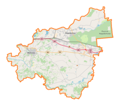 Mapa konturowa powiatu wielickiego, po lewej znajduje się punkt z opisem „Muzeum Żup Krakowskich Wieliczka”