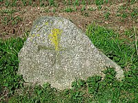 Wanderblockteilstück mit eingehauenem Kreuz, nordwestlich von Klein-Leversen, ca. 70 m südöstlich von ND WL 00017 an der Straße Barkendicke; seit dem 10. Juni 1955 Naturdenkmal