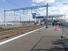 Vue du dépôt depuis le quai pour Paris.