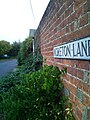 Moreton Lane Street Sign