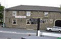 The Holden Arms pub at the junction with Grane Road.