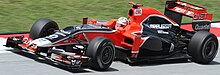 Photographie de Timo Glock dans le cockpit de sa monoplace