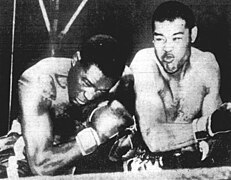 Ezzard Charles vs Joe Louis 1950.jpg