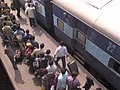 People waiting at New Delhi Railway Station