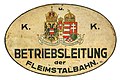 Schild der k.u.k Betriebsleitung der Fleimstalbahn