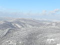 Pohľad z Klenovej na Brezovské Karpaty, v pozadí je Myjavská pahorkatina (Bradlo)