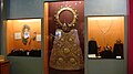 Old regalia of the image including its breastplate, halos, crowns, scepters, baton, and vestments in the museum.