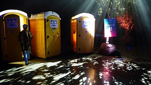 The original toilets from the festival, which were used in the commemorative performance 06:29