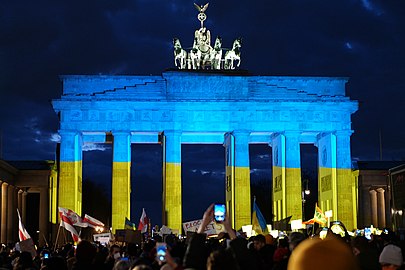 Lit up in the colours of the Ukrainian flag during a solidarity protest, 24 February 2022