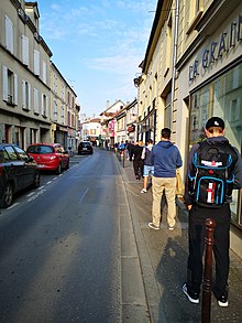 Pandémie de Covid-19 et file d'attente.jpg