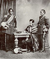 Image 22Malagasy Embassy to Europe in 1863. Left to right: Rainifiringa Ralaimaholy, Rev. John Duffus and Rasatranabo aka Rainandrianandraina. (from History of Madagascar)