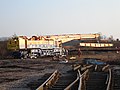 GrantRail Kirow 1200 removing scrap panels at Knighton Junction 2006