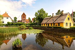 The historic centre of Herlev, with the church and village pond.