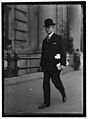 William C. Mooney, congressman from Woodsfield, Ohio, United States, in stroller and bowler hat (1915)