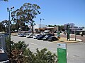 View of south-eastern car park and Whatley Crescent from shared path adjacent to railway.