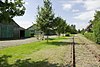 Kleine goederenloods naast station Baarland