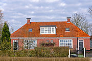 Het sterk verbouwde voormalige armenhuis ('t Blokhoes)