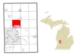 Location within Kent County (red) and administered portions of the Comstock Park (1) and Northview (2) CDPs (pink)