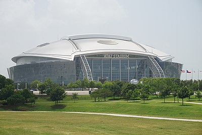Exterior view of AT&T stadium from afar.