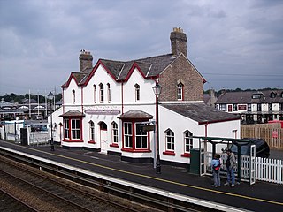 Llanfairpwllgwyngyllgogerychwyrndrobwllllantysiliogogogoch (meaning St Mary's Church in the Hollow of the White Hazel Near to the Rapid Whirlpool of Llantysilio of the Red Cave), on the Isle of Anglesey in Wales has the longest name of any station in the United Kingdom